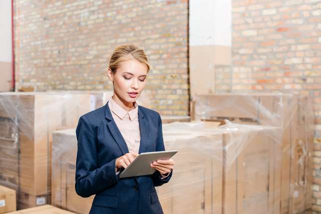 young beautiful businesswoman looking on tablet at 2021 09 03 12 16 43 utc